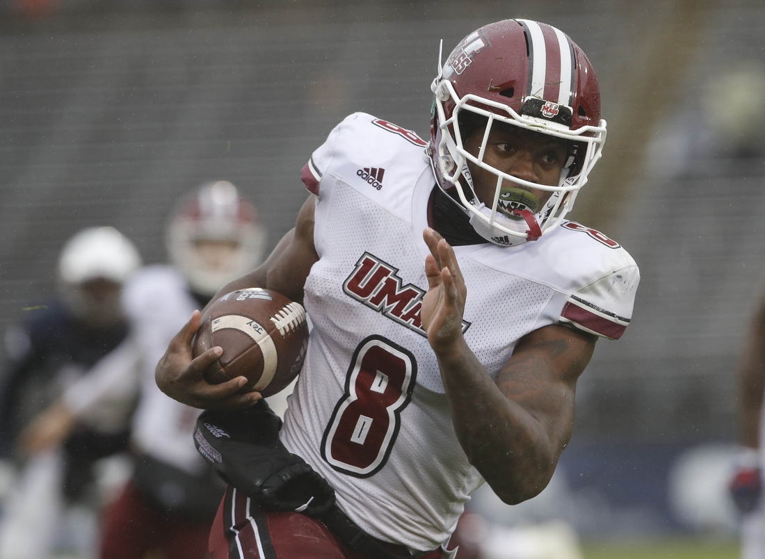 Oct 27, 2018; East Hartford, CT, USA; Massachusetts Minutemen running back Marquis Young (8) runs the ball against the Connecticut Huskies in the second half at Pratt & Whitney Stadium at Rentschler Field. UMass defeated UConn 22-17. Mandatory Credit: David Butler II-USA TODAY Sports