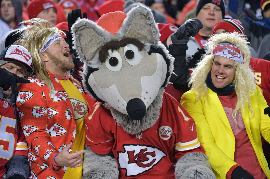 Jan 12, 2019; Kansas City, MO, USA; Fans dance with the Kansas City Chiefs mascot during the third quarter against the Indianapolis Colts in an AFC Divisional playoff football game at Arrowhead Stadium. Mandatory Credit: Denny Medley-USA TODAY Sports