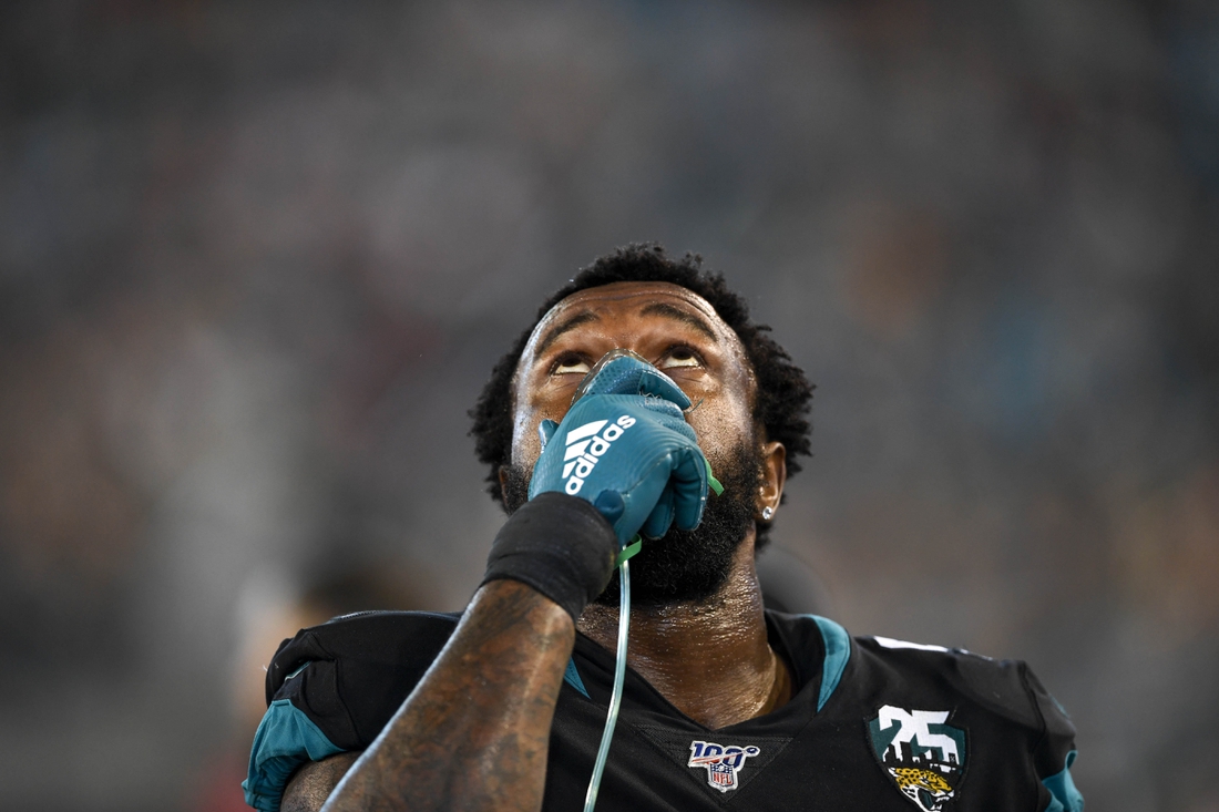 Dec 29, 2019; Jacksonville, Florida, USA; Jacksonville Jaguars defensive end Yannick Ngakoue (91) receives oxygen on the sideline during the third quarter against the Indianapolis Colts at TIAA Bank Field. Mandatory Credit: Douglas DeFelice-USA TODAY Sports