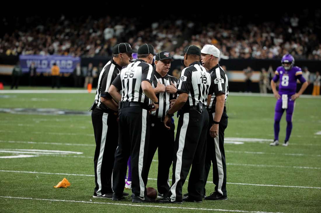 Jan 5, 2020; New Orleans, Louisiana, USA; Officials huddle following a penalty during the third quarter of a NFC Wild Card playoff football game between the New Orleans Saints and the Minnesota Vikings at the Mercedes-Benz Superdome. Mandatory Credit: Derick Hingle-USA TODAY Sports