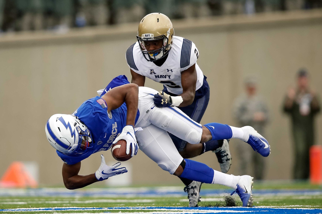 Oct 6, 2018; Colorado Springs, CO, USA; Air Force Falcons wide receiver Geraud Sanders (7) makes a catch ahead of Navy Midshipmen cornerback Jarid Ryan (2) in the third quarter at Falcon Stadium. Mandatory Credit: Isaiah J. Downing-USA TODAY Sports