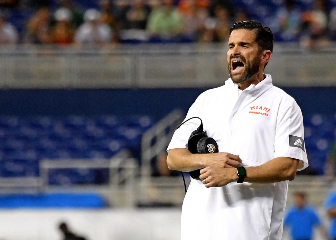 Nov 23, 2019; Miami, FL, USA; Miami Hurricanes head coach Manny Diaz yells out during the first half against the FIU Golden Panthers at Marlins Park. Mandatory Credit: Steve Mitchell-USA TODAY Sports