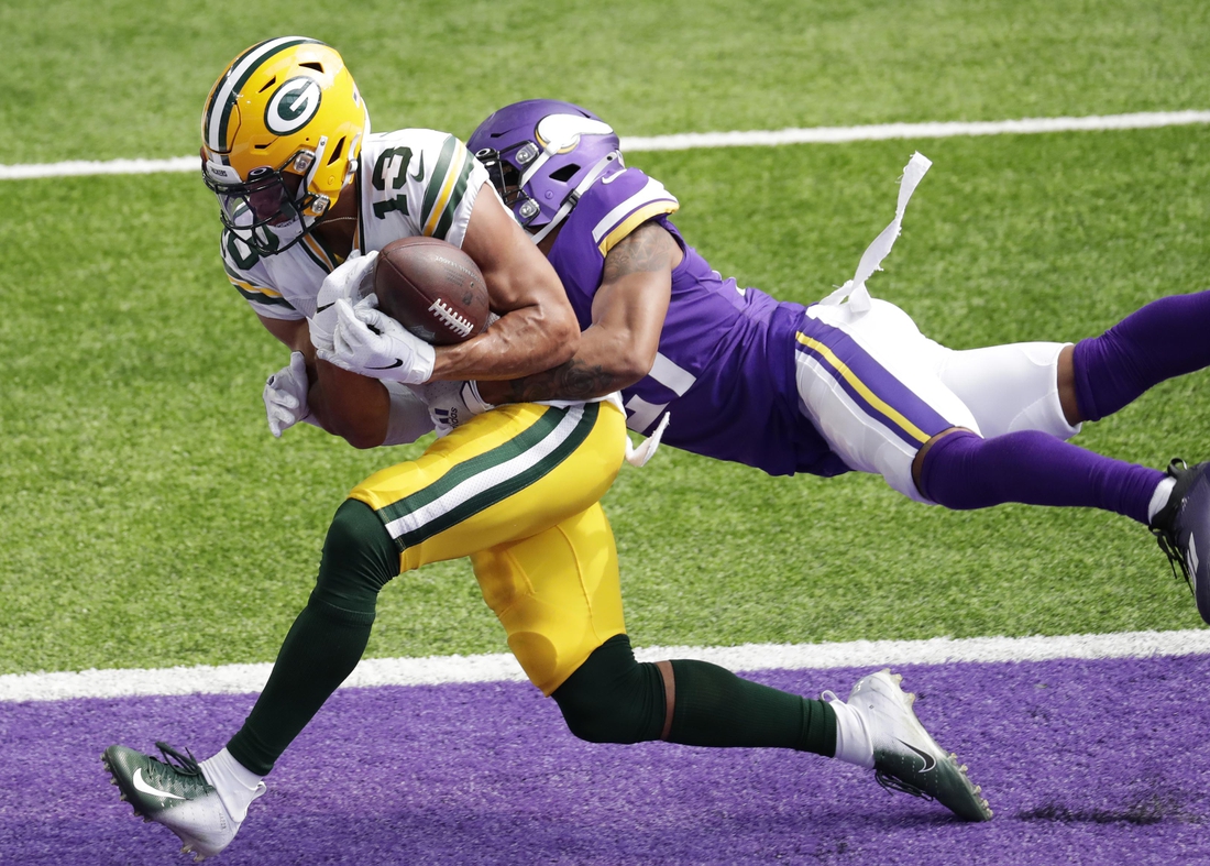 Sep 13, 2020; Minneapolis, MN, USA; Green Bay Packers wide receiver Allen Lazard (13) scores a touchdown against Minnesota Vikings cornerback Mike Hughes (21) in the fourth quarter during their football game Sunday, September 13, 2020, at U.S. Bank Stadium in Minneapolis, Minn. Green Bay won 43-34.  Mandatory Credit: Dan Powers/Appleton Post-Crescsent-USA TODAY NETWORK