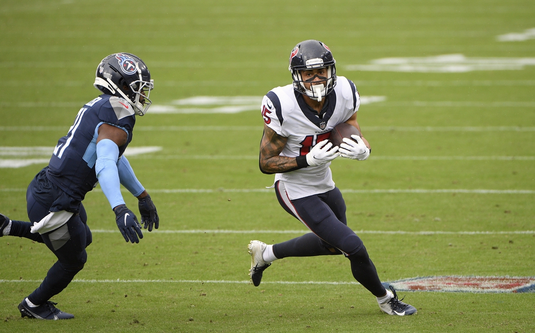 Oct 18, 2020; Nashville, Tennessee, USA; Houston Texans wide receiver Will Fuller (15) runs after making a catch against the Tennessee Titans during the first quarter at Nissan Stadium. Mandatory Credit: Steve Roberts-USA TODAY Sports