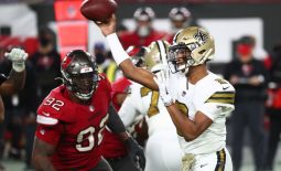 Nov 8, 2020; Tampa, Florida, USA;New Orleans Saints quarterback Jameis Winston (2) throws the ball as Tampa Bay Buccaneers defensive end William Gholston (92) rushes  during the second half at Raymond James Stadium. Mandatory Credit: Kim Klement-USA TODAY Sports
