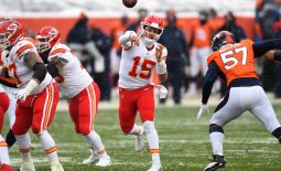 Oct 25, 2020; Denver, Colorado, USA; Kansas City Chiefs quarterback Patrick Mahomes (15) passes the ball in the first half against the Denver Broncos at Empower Field at Mile High. Mandatory Credit: Ron Chenoy-USA TODAY Sports