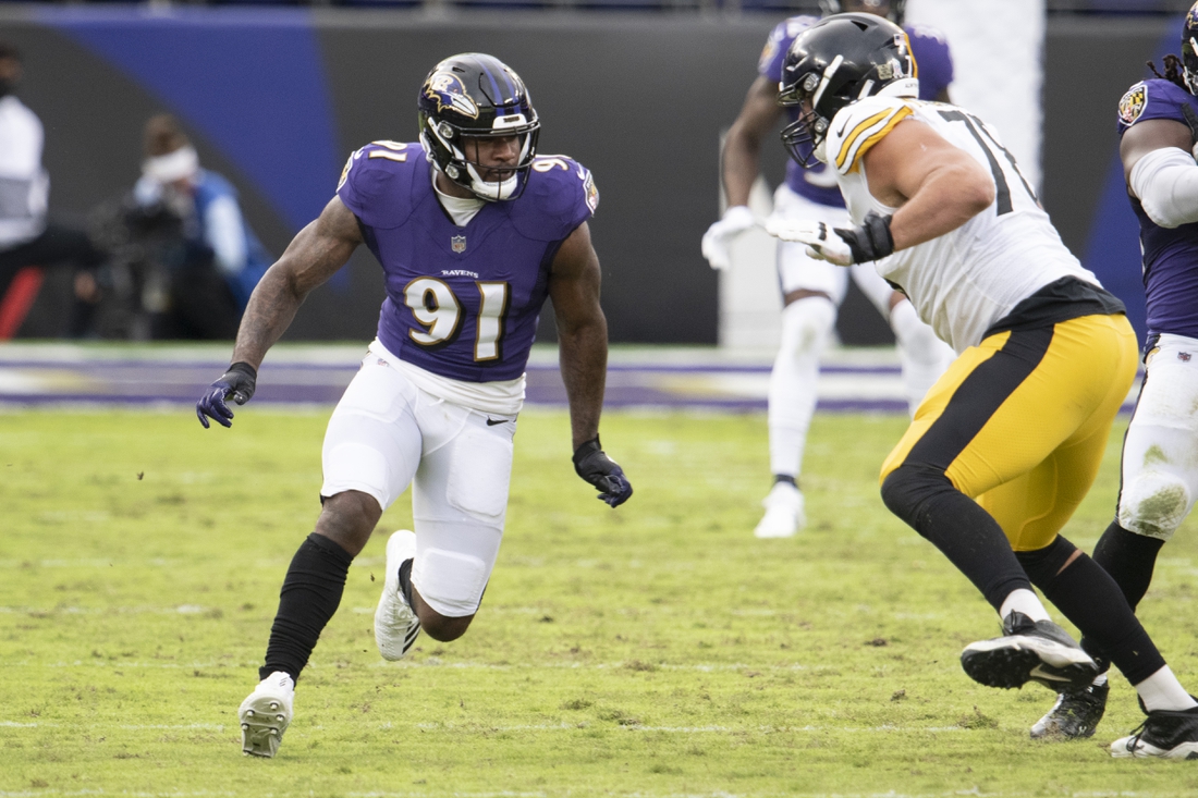 Nov 1, 2020; Baltimore, Maryland, USA; Baltimore Ravens defensive end Yannick Ngakoue (91) rushes during the second half as Pittsburgh Steelers offensive tackle Alejandro Villanueva (78) blocks at M&T Bank Stadium. Mandatory Credit: Tommy Gilligan-USA TODAY Sports