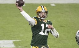 Dec 19, 2020; Green Bay, Wisconsin, USA; Green Bay Packers quarterback Aaron Rodgers (12) throws a pass in the second quarter during the game against the Carolina Panthers at Lambeau Field. Mandatory Credit: Benny Sieu-USA TODAY Sports
