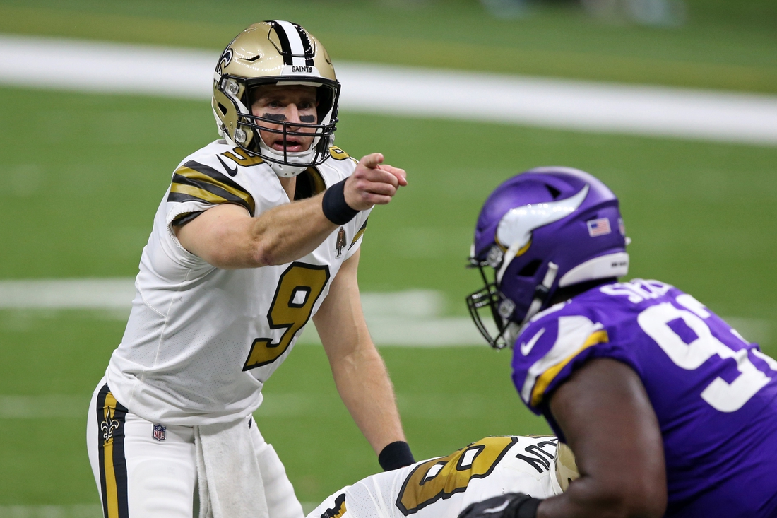 Dec 25, 2020; New Orleans, Louisiana, USA; New Orleans Saints quarterback Drew Brees (9) gestures in the second quarter against the Minnesota Vikings at the Mercedes-Benz Superdome. Mandatory Credit: Chuck Cook-USA TODAY Sports