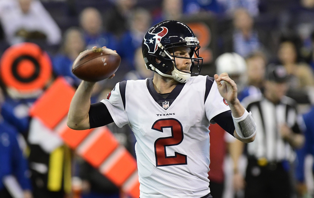 Dec 31, 2017; Indianapolis, IN, USA; Houston Texans quarterback T.J. Yates (2) drops back to pass during the fourth quarter against the Indianapolis Colts at Lucas Oil Stadium. Mandatory Credit: Thomas J. Russo-USA TODAY Sports