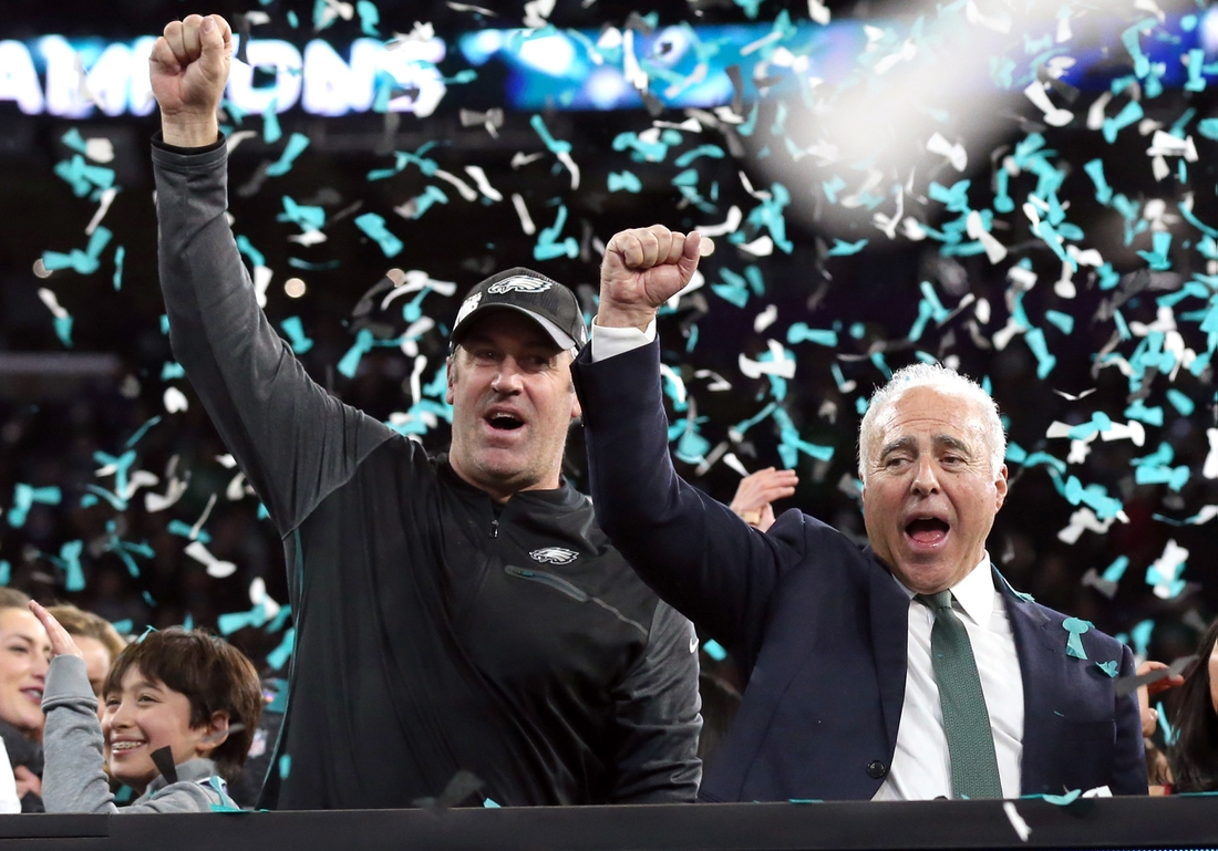 Feb 4, 2018; Minneapolis, MN, USA; Philadelphia Eagles head coach Doug Pederson celebrates with owner Jeffrey Lurie after defeating the New England Patriots 41-33 in Super Bowl LII at U.S. Bank Stadium. Mandatory Credit: Matthew Emmons-USA TODAY Sports