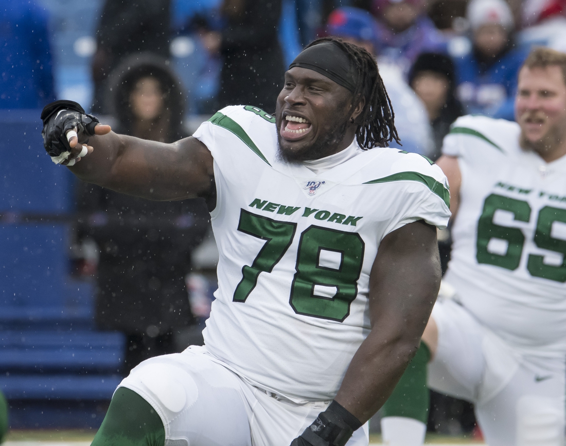 Dec 29, 2019; Orchard Park, New York, USA; New York Jets center Jonotthan Harrison (78) warms up prior to a game against the Buffalo Bills at New Era Field. Mandatory Credit: Mark Konezny-USA TODAY Sports