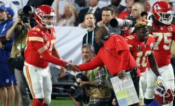 Feb 2, 2020; Miami Gardens, Florida, USA; Kansas City Chiefs quarterback Patrick Mahomes (15) shakes hands with offensive coordinator Eric Bieniemy after a first quarter touchdown against the San Francisco 49ers in Super Bowl LIV at Hard Rock Stadium. Mandatory Credit: Geoff Burke-USA TODAY Sports