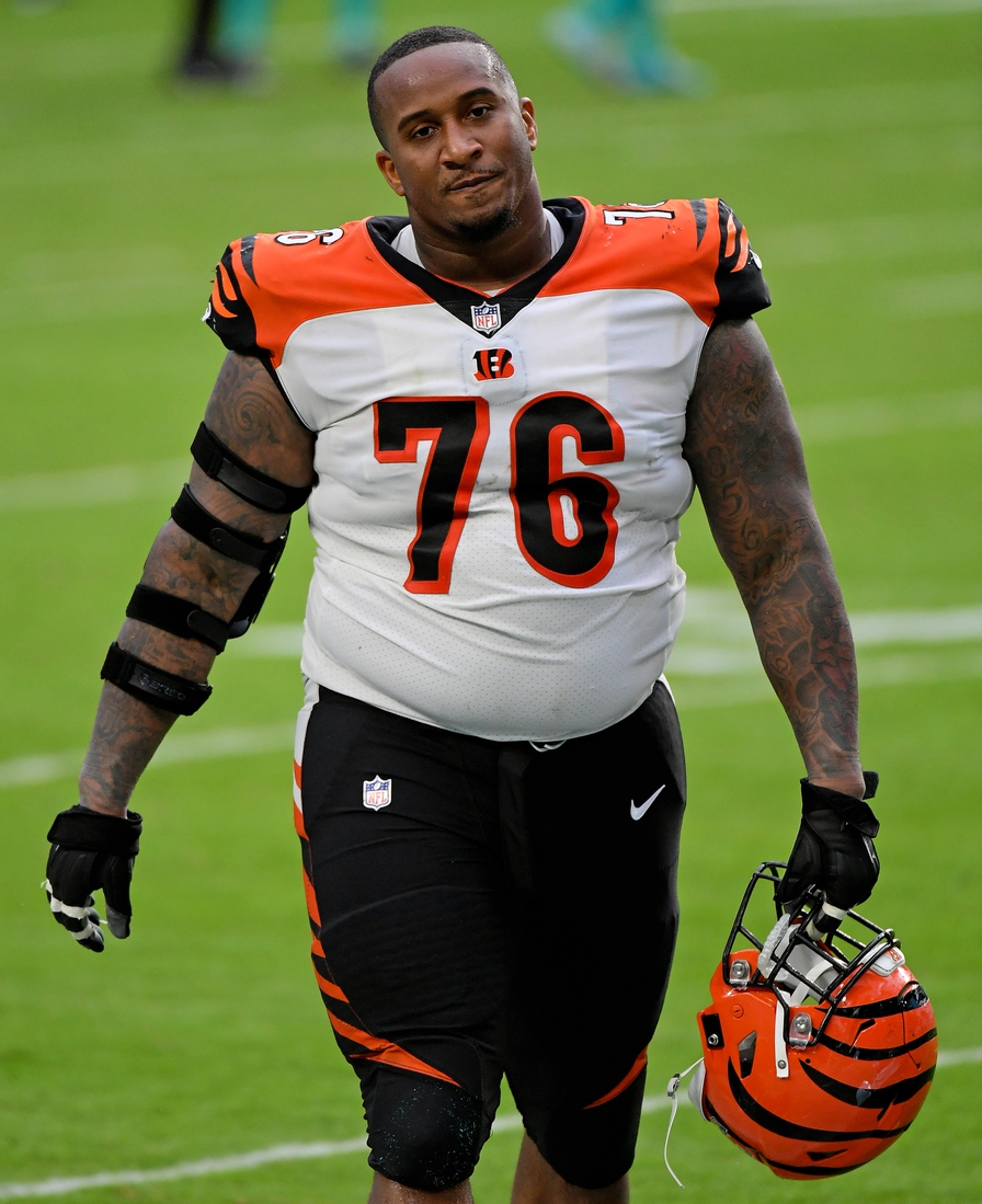 Dec 6, 2020; Miami Gardens, Florida, USA; Cincinnati Bengals defensive tackle Mike Daniels (76) walks off the field after the game against the Miami Dolphins at Hard Rock Stadium. Mandatory Credit: Jasen Vinlove-USA TODAY Sports