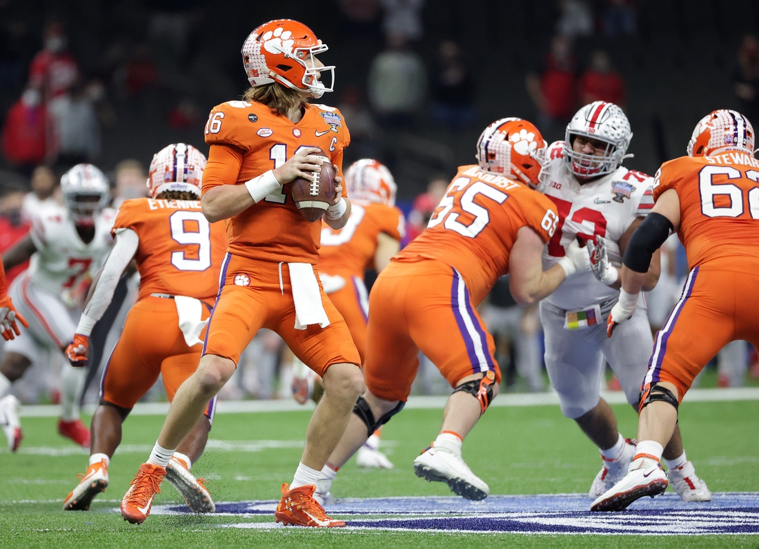 Jan 1, 2021; New Orleans, LA, USA; Clemson Tigers quarterback Trevor Lawrence (16) stands in the pocket with the ball during the first half against the Ohio State Buckeyes at Mercedes-Benz Superdome. Mandatory Credit: Derick E. Hingle-USA TODAY Sports