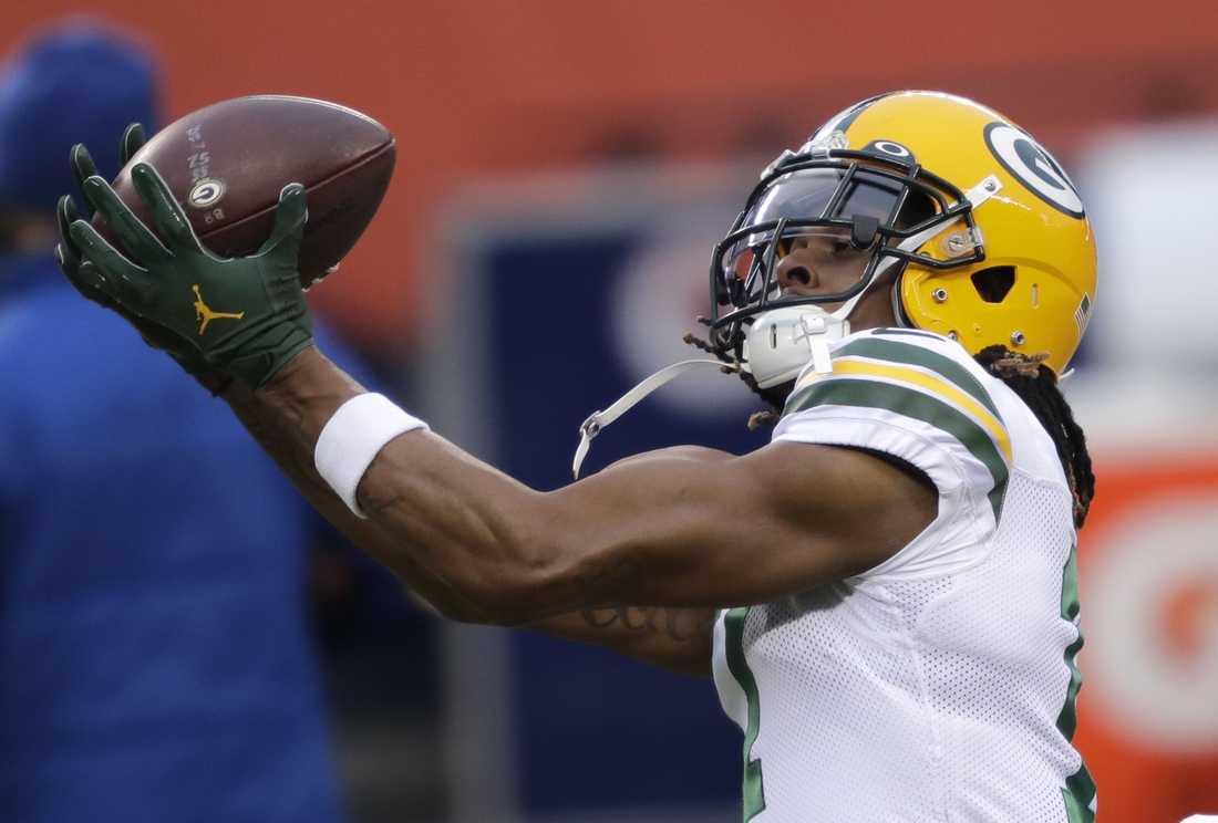 Jan 3, 2021; Chicago, IL, USA; Green Bay Packers wide receiver Davante Adams (17) warms up prior to playing against the Chicago Bears during their football game Sunday, January 3, 2021, at Soldier Field in Chicago, Ill.  Mandatory Credit: Dan Powers-USA TODAY NETWORK
