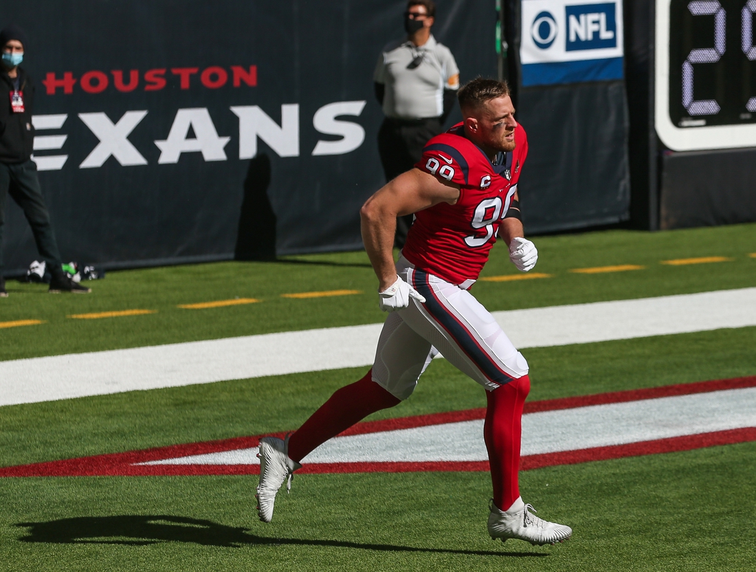 Dec 6, 2020; Houston, Texas, USA; Houston Texans defensive end J.J. Watt (99) runs onto the field before the game against the Indianapolis Colts at NRG Stadium. Mandatory Credit: Troy Taormina-USA TODAY Sports