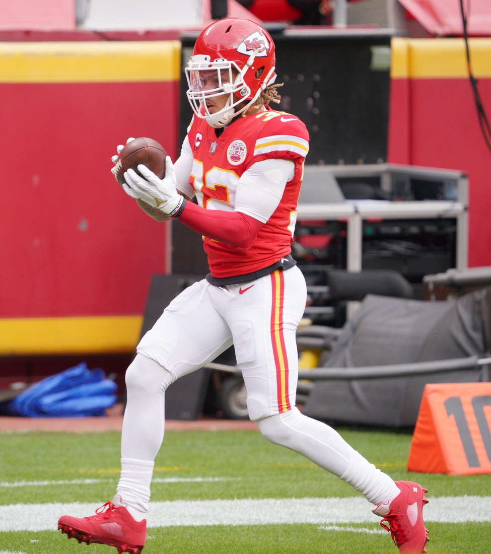 Jan 17, 2021; Kansas City, Missouri, USA; Kansas City Chiefs strong safety Tyrann Mathieu (32) warms up before the AFC Divisional Round playoff game against the Cleveland Browns at Arrowhead Stadium. Mandatory Credit: Denny Medley-USA TODAY Sports