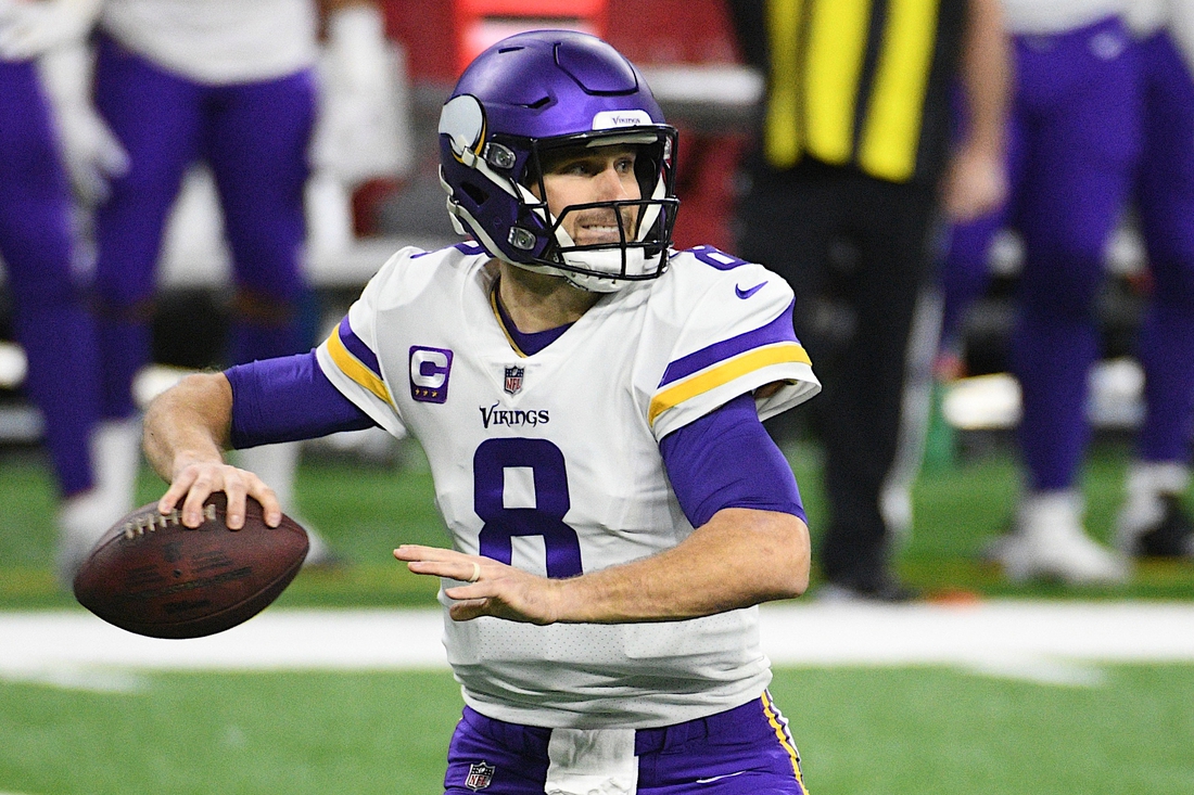 Jan 3, 2021; Detroit, Michigan, USA; Minnesota Vikings quarterback Kirk Cousins (8) throws a pass against the Detroit Lions during the first quarter at Ford Field. Mandatory Credit: Tim Fuller-USA TODAY Sports
