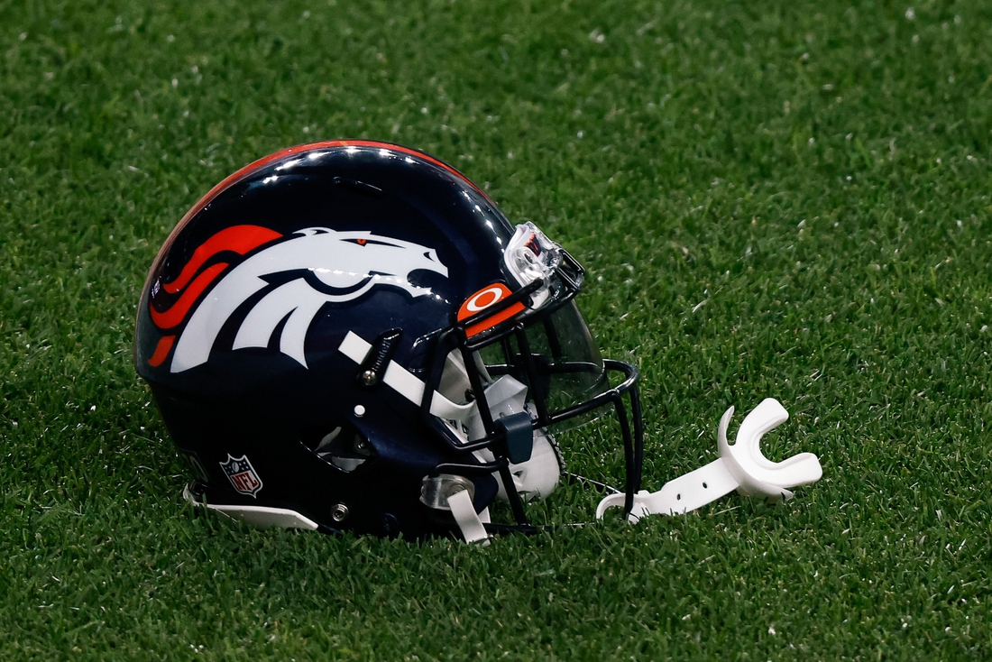 Sep 14, 2020; Denver, Colorado, USA; A Denver Broncos helmet on the ground before the game against the Tennessee Titans at Empower Field at Mile High. Mandatory Credit: Isaiah J. Downing-USA TODAY Sports