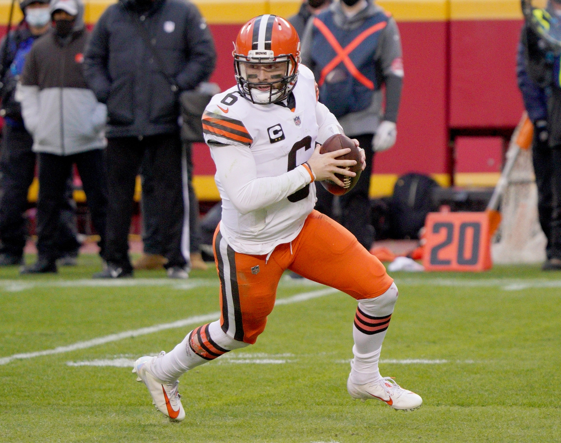 Jan 17, 2021; Kansas City, Missouri, USA; Cleveland Browns quarterback Baker Mayfield (6) drops back to pass during the AFC Divisional Round playoff game against the Kansas City Chiefs at Arrowhead Stadium. Mandatory Credit: Denny Medley-USA TODAY Sports