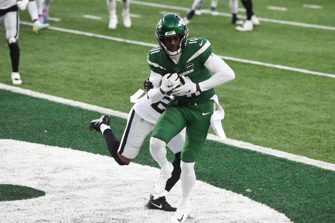 New York Jets wide receiver Denzel Mims (11) makes a catch for a two-point conversion in the second half. The Jets lose to the Raiders, 31-28, at MetLife Stadium on Sunday, Dec. 6, 2020, in East Rutherford.

Nyj Vs Lv