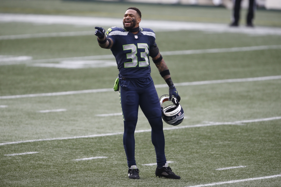 Jan 9, 2021; Seattle, Washington, USA; Seattle Seahawks safety Jamal Adams (33) yells to the sidelines during the first quarter against the Los Angeles Rams at Lumen Field. Mandatory Credit: Joe Nicholson-USA TODAY Sports