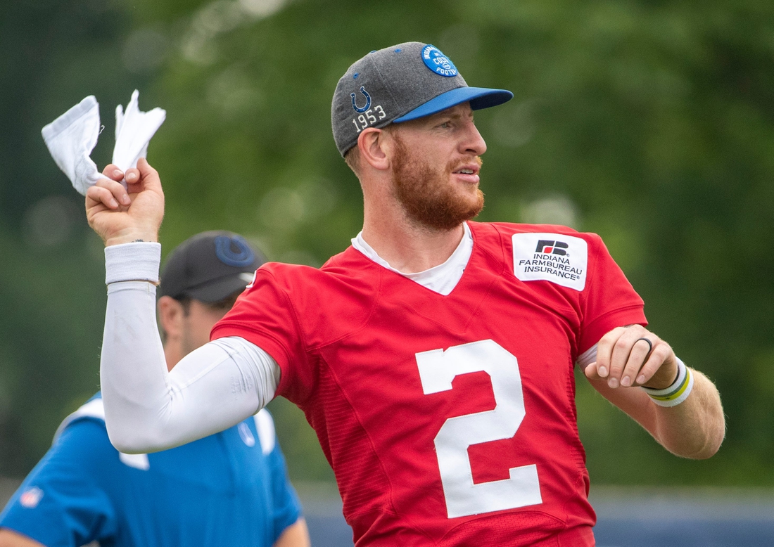 Indianapolis Colts quarterback Carson Wentz (2) at the start of practice at Grand Park in Westfield on Thursday, July 29, 2021, on the second full day of workouts of this summer's Colts training camp.

Colts Camp Revs Up