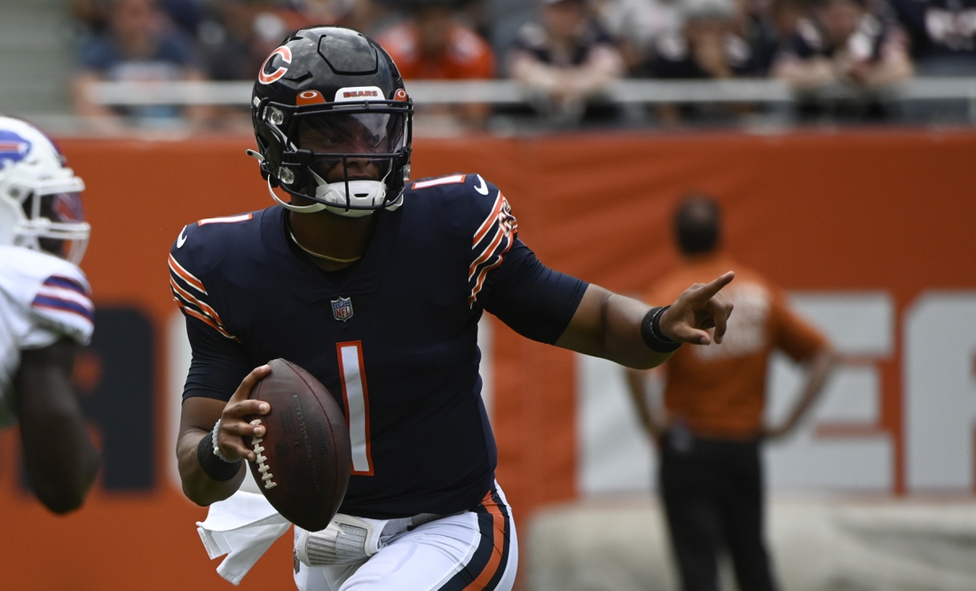 Aug 21, 2021; Chicago, Illinois, USA;  Chicago Bears quarterback Justin Fields (1) looks to pass against the Buffalo Bills during the second half at Soldier Field. Mandatory Credit: Matt Marton-USA TODAY Sports