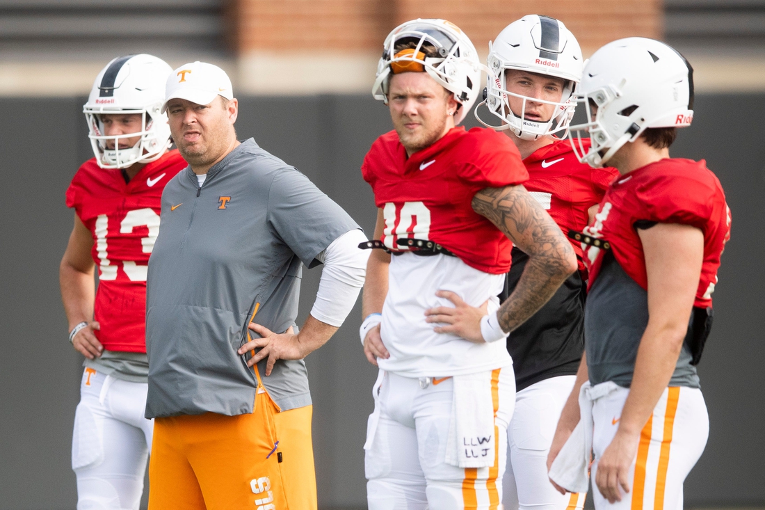 Tennessee head coach Josh Heupel stands with the quarterbacks during the team's football practice on Tuesday, August 10, 2021.

Kns Ut Football Practice Bp