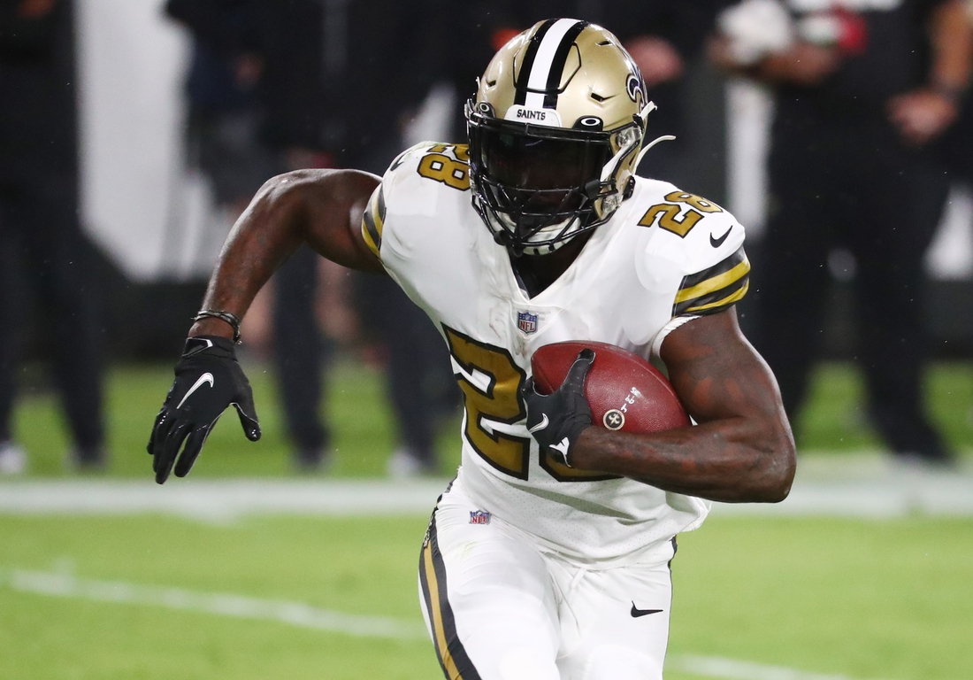 Nov 8, 2020; Tampa, Florida, USA; New Orleans Saints running back Latavius Murray (28) runs the ball against the Tampa Bay Buccaneers in the first quarter of a NFL game at Raymond James Stadium. Mandatory Credit: Kim Klement-USA TODAY Sports