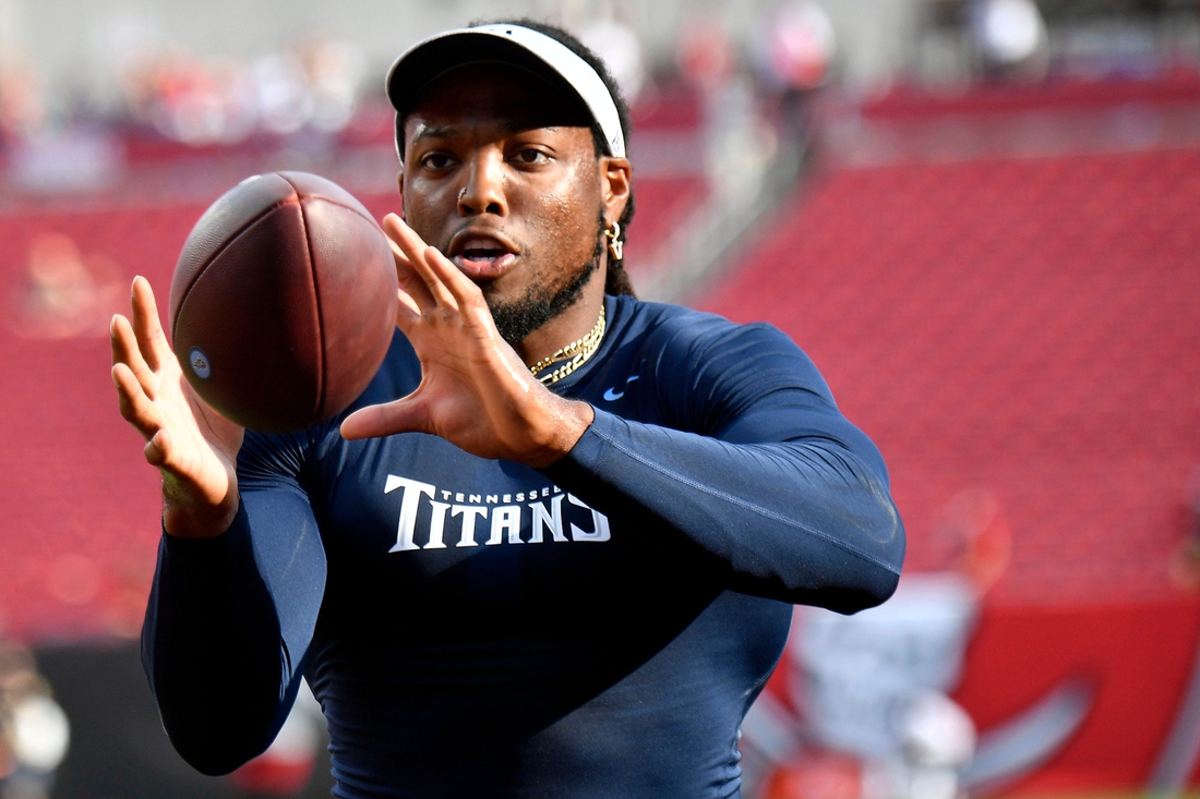Tennessee Titans running back Derrick Henry (22) warms up before a preseason game against the Buccaneers at Raymond James Stadium Saturday, Aug. 21, 2021 in Tampa, Fla.

Titans Bucs 008