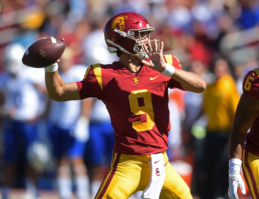 Sep 4, 2021; Los Angeles, California, USA;   USC Trojans quarterback Kedon Slovis (9) sets to pass in the first half of the game against the San Jose State Spartans at United Airlines Field at Los Angeles Memorial Coliseum. Mandatory Credit: Jayne Kamin-Oncea-USA TODAY Sports