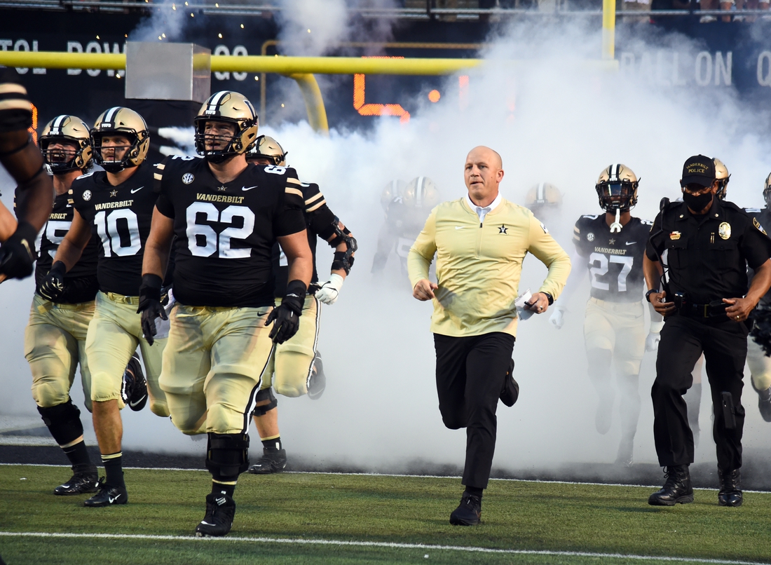 Sep 4, 2021; Nashville, Tennessee, USA; Vanderbilt Commodores head coach Clark Lea takes the field before the game against the East Tennessee State Buccaneers at Vanderbilt Stadium. Mandatory Credit: Christopher Hanewinckel-USA TODAY Sports
