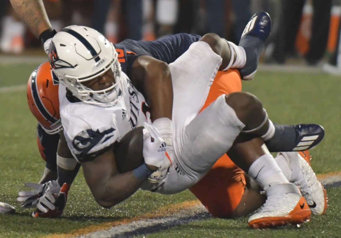 Sep 4, 2021; Champaign, Illinois, USA;  UTSA Roadrunners running back Sincere McCormick (3) is tackled by Illinois Fighting Illini defensive lineman Roderick Perry II (96) in the first half of Saturday   s game at Memorial Stadium. Mandatory Credit: Ron Johnson-USA TODAY Sports