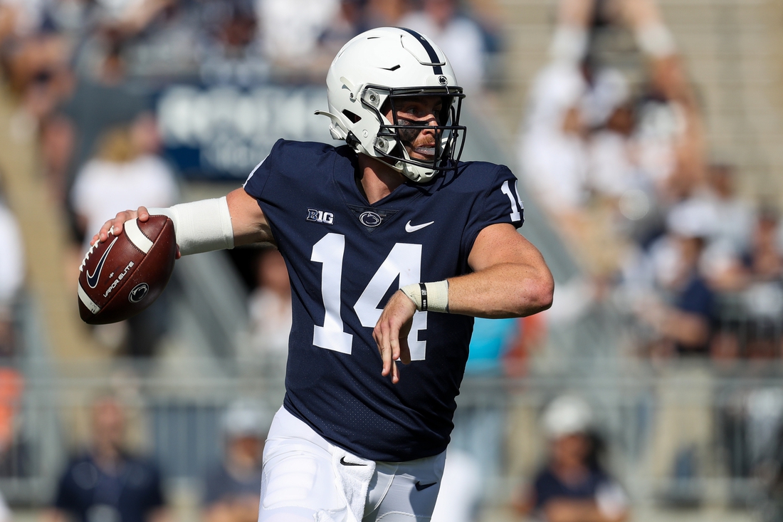 Sep 11, 2021; University Park, Pennsylvania, USA; Penn State Nittany Lions quarterback Sean Clifford (14) throws a pass during the first quarter against the Ball State Cardinals at Beaver Stadium. Mandatory Credit: Matthew OHaren-USA TODAY Sports