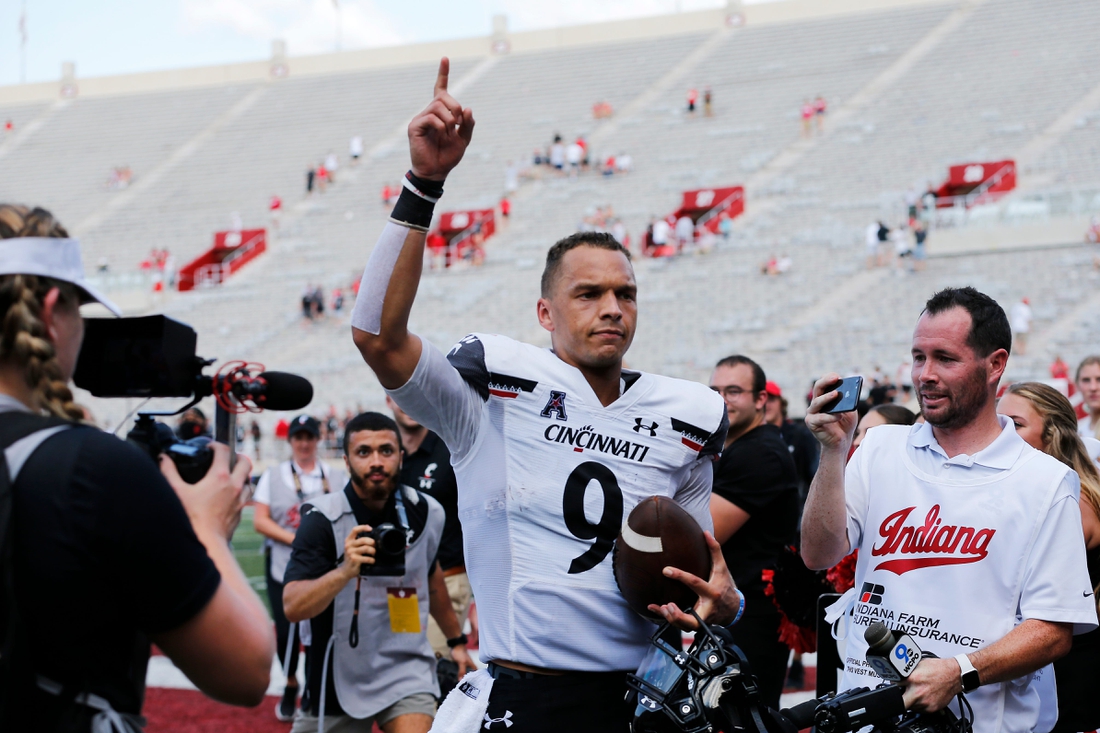 Cincinnati Bearcats quarterback Desmond Ridder (9) runs for the locker room after the Bearcats win in the fourth quarter of the NCAA football game between the Indiana Hoosiers and the Cincinnati Bearcats at Memorial Stadium in Bloomington, Ind., on Saturday, Sept. 18, 2021. The Bearcats won 38-24.

Cincinnati Bearcats At Indiana Hoosiers Football