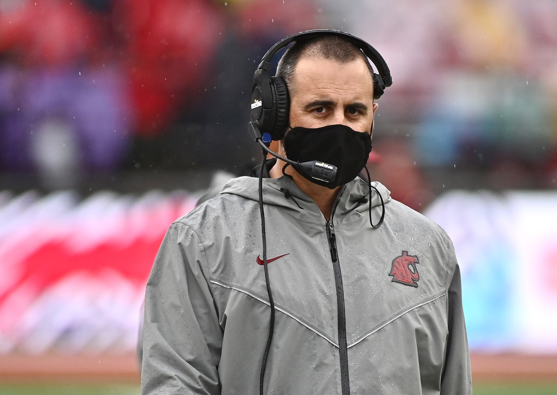 Sep 18, 2021; Pullman, Washington, USA; Washington State Cougars head coach Nick Rolovich looks on during a game against the USC Trojans in the first half at Gesa Field at Martin Stadium. Mandatory Credit: James Snook-USA TODAY Sports