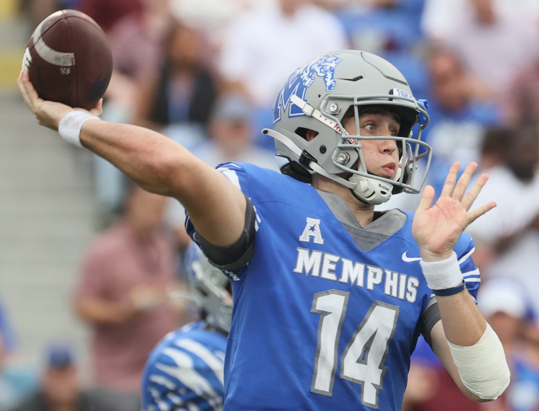 Memphis Tigers quarterback Seth Henigan throws the ball against the Mississippi State Bulldogs at Liberty Bowl Memorial Stadium on Saturday, Sept. 18, 2021.

Jrca5793