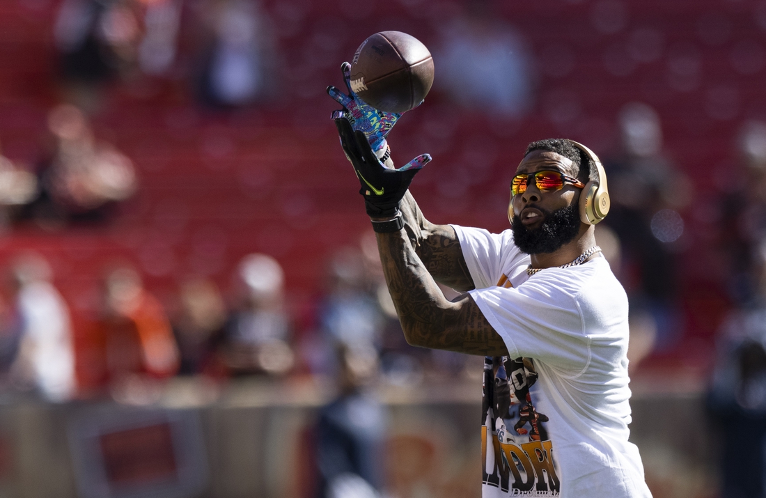 Sep 26, 2021; Cleveland, Ohio, USA; Cleveland Browns wide receiver Odell Beckham Jr. (13) catches the ball during warmups before the game against the Chicago Bears at FirstEnergy Stadium. Mandatory Credit: Scott Galvin-USA TODAY Sports