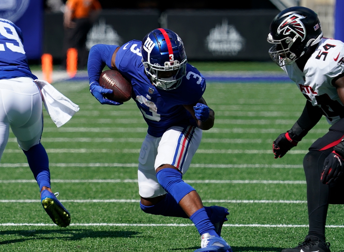 Sep 26, 2021; E. Rutherford, N.J., USA;  New York Giants wide receiver Sterling Shepard (3) carries the ball as Atlanta Falcons linebacker Foye Oluokun (54) defends in the first half at MetLife Stadium. Mandatory Credit: Robert Deutsch-USA TODAY Sports