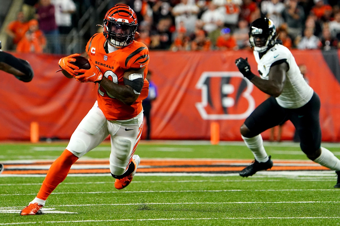 Cincinnati Bengals running back Joe Mixon (28) carries the ball in the first quarter during a Week 4 NFL football game against the Jacksonville Jaguars, Thursday, Sept. 30, 2021, at Paul Brown Stadium in Cincinnati.

Jacksonville Jaguars At Cincinnati Bengals Sept 30