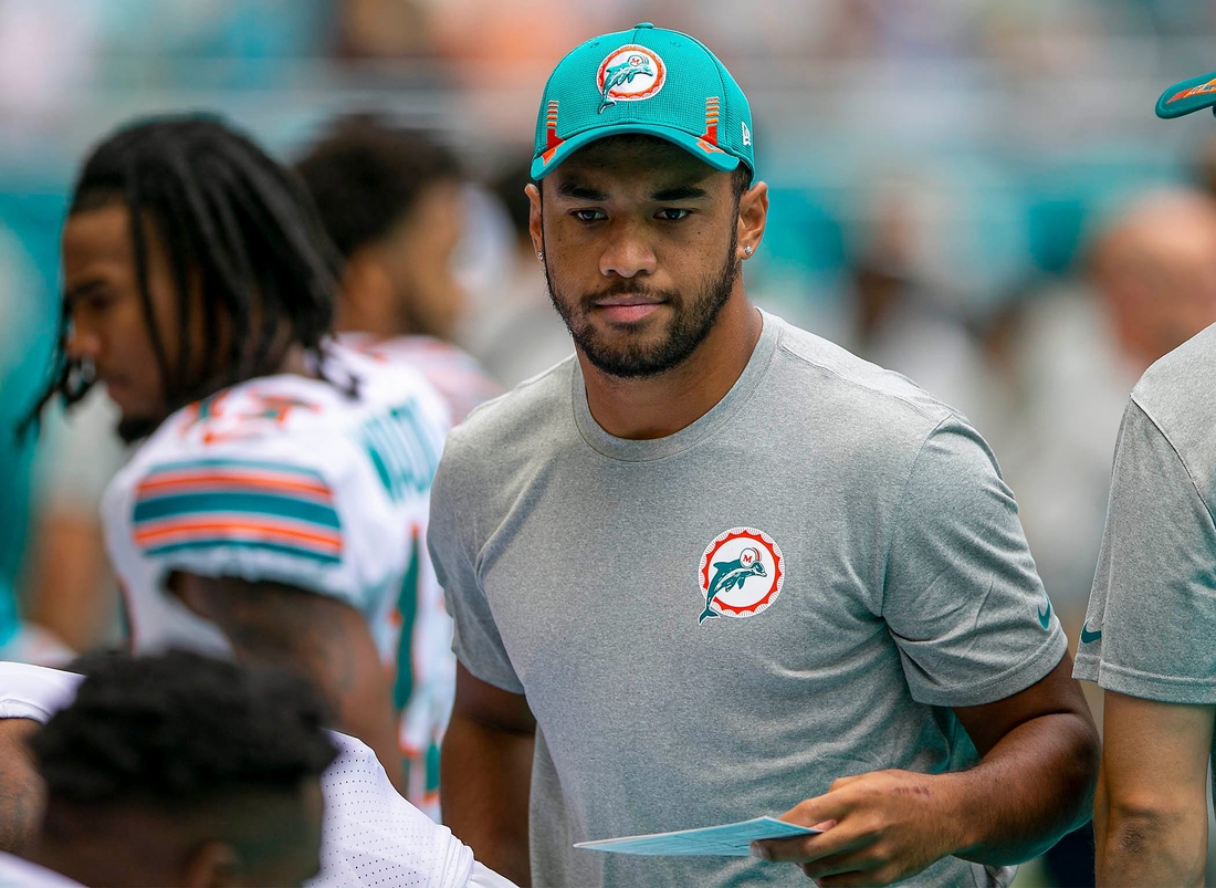 Miami Dolphins Miami Dolphins quarterback Tua Tagovailoa (1) greets teammates before the start of the game against Indianapolis Colts during NFL game at Hard Rock Stadium Sunday in Miami Gardens.