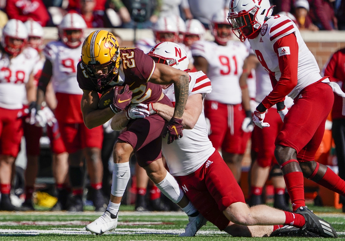 Oct 16, 2021; Minneapolis, Minnesota, USA; Minnesota Golden Gophers wide receiver Mike Brown-Stephens (22) runs for more yards after the catch against the Nebraska Cornhuskers during the second quarter at Huntington Bank Stadium. Mandatory Credit: Nick Wosika-USA TODAY Sports