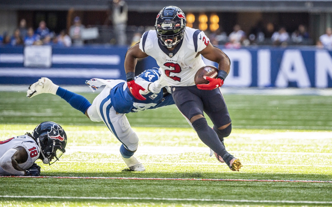 Oct 17, 2021; Indianapolis, Indiana, USA; Houston Texans running back Mark Ingram (2) attempts to get away from Indianapolis Colts outside linebacker Zaire Franklin (44) during the second quarter at Lucas Oil Stadium. Mandatory Credit: Marc Lebryk-USA TODAY Sports
