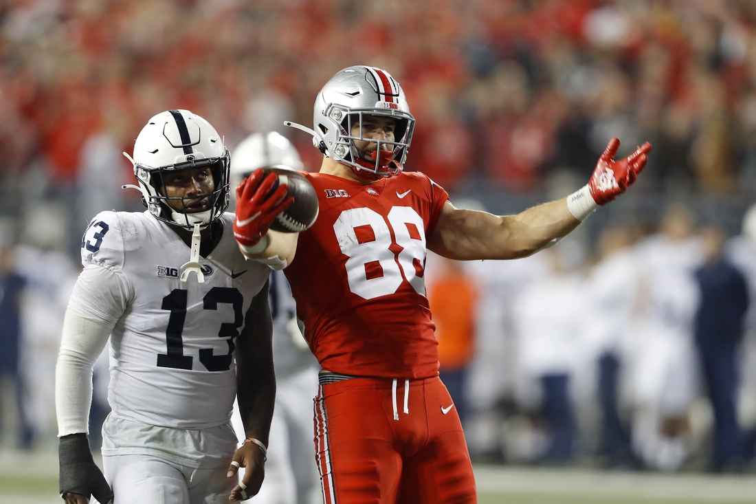Oct 30, 2021; Columbus, Ohio, USA; Ohio State Buckeyes tight end Jeremy Ruckert (88) celebrates the first down catch in the fourth quarter against the Penn State Nittany Lions at Ohio Stadium. Mandatory Credit: Joseph Maiorana-USA TODAY Sports