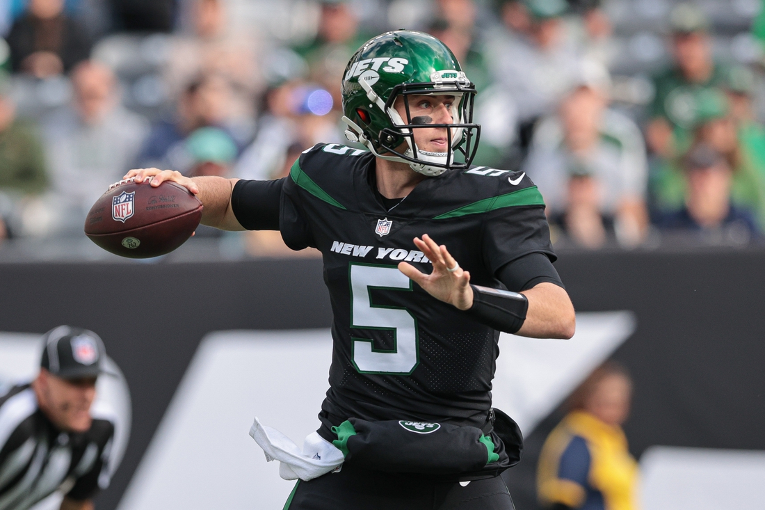 Oct 31, 2021; East Rutherford, New Jersey, USA; New York Jets quarterback Mike White (5) passes the ball against the Cincinnati Bengals during the first half at MetLife Stadium. Mandatory Credit: Vincent Carchietta-USA TODAY Sports