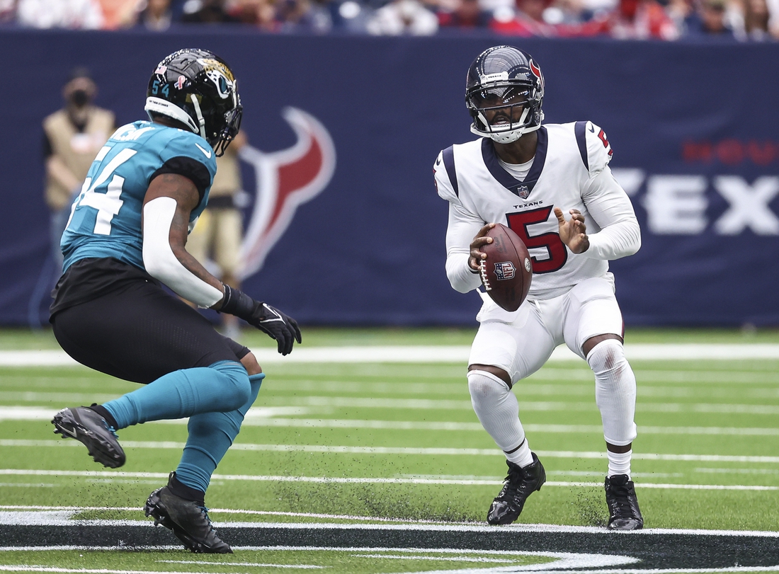 Sep 12, 2021; Houston, Texas, USA; Houston Texans quarterback Tyrod Taylor (5) looks to pass the ball during the second quarter against the Jacksonville Jaguars at NRG Stadium. Mandatory Credit: Troy Taormina-USA TODAY Sports