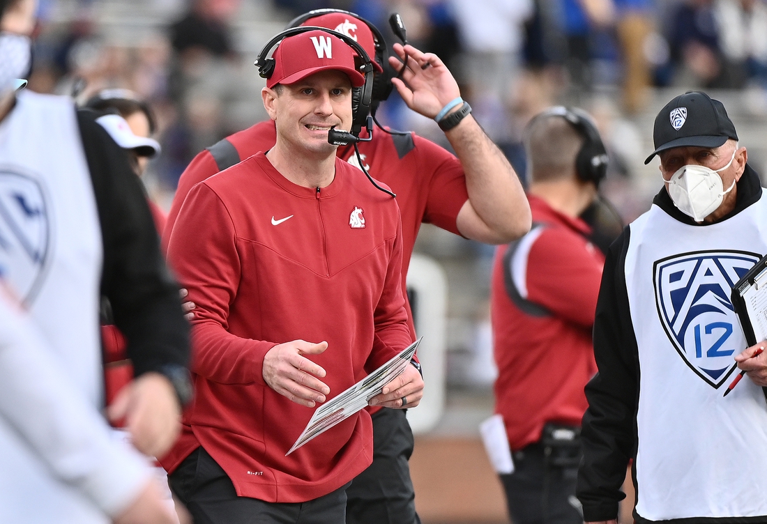 Oct 23, 2021; Pullman, Washington, USA; Washington State Cougars head coach interim Jake Dickert reacts after a play during a game against the Brigham Young Cougars in the second half at Gesa Field at Martin Stadium. BYU won 21-19. Mandatory Credit: James Snook-USA TODAY Sports
