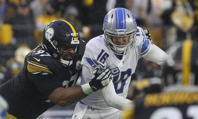 Nov 14, 2021; Pittsburgh, Pennsylvania, USA;  Pittsburgh Steelers defensive end Cameron Heyward (97) sacks Detroit Lions quarterback Jared Goff (16) in overtime at Heinz Field. The game ended in a 16-16 tie. Mandatory Credit: Charles LeClaire-USA TODAY Sports